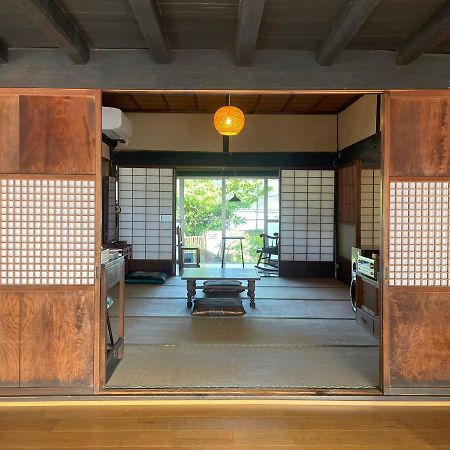 ゲストハウス　にじゅうよん Sakashita Экстерьер фото